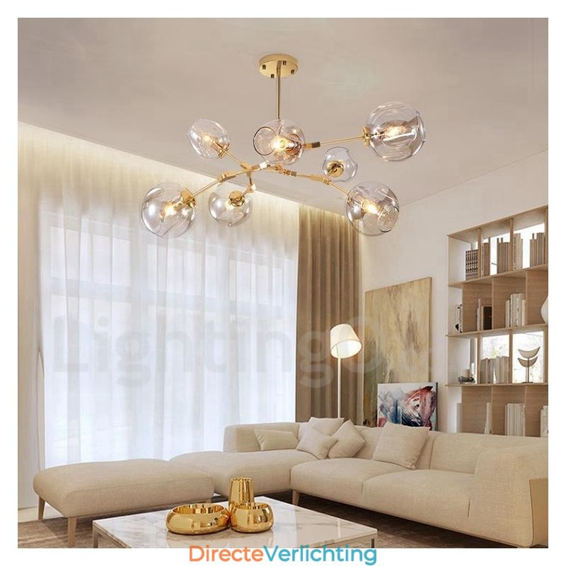 Moderne eigentijdse kroonluchter met 7 lampen en heldere glazen kap en lamp
