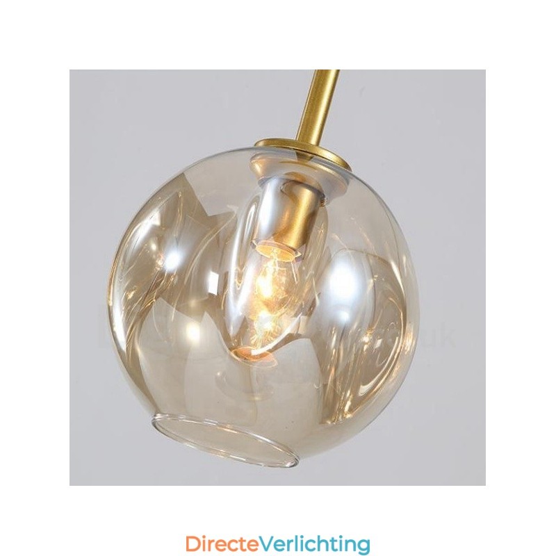 Moderne eigentijdse kroonluchter met 7 lampen en heldere glazen kap en lamp
