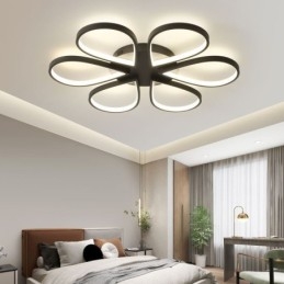 Minimalistische plafondlamp in de vorm van een klaverblad