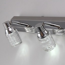 Moderne wandlamp met glazen bubbelkap, spiegelfrontstijl